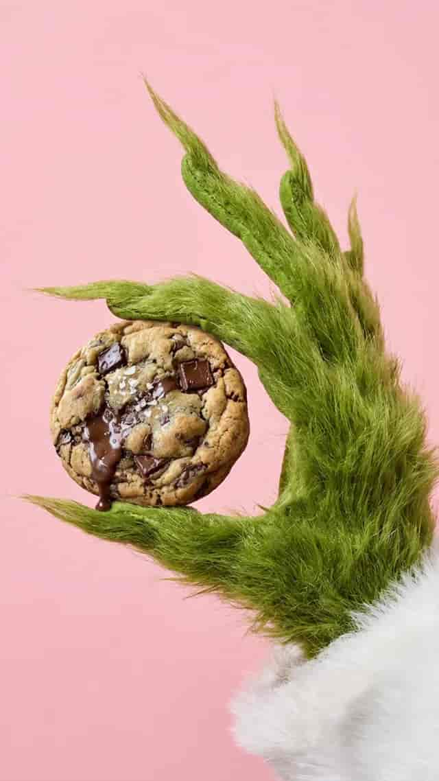 Grinch Hand Holiday Gift background blur